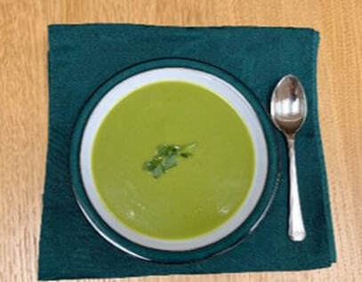 Bowl of green pea soup